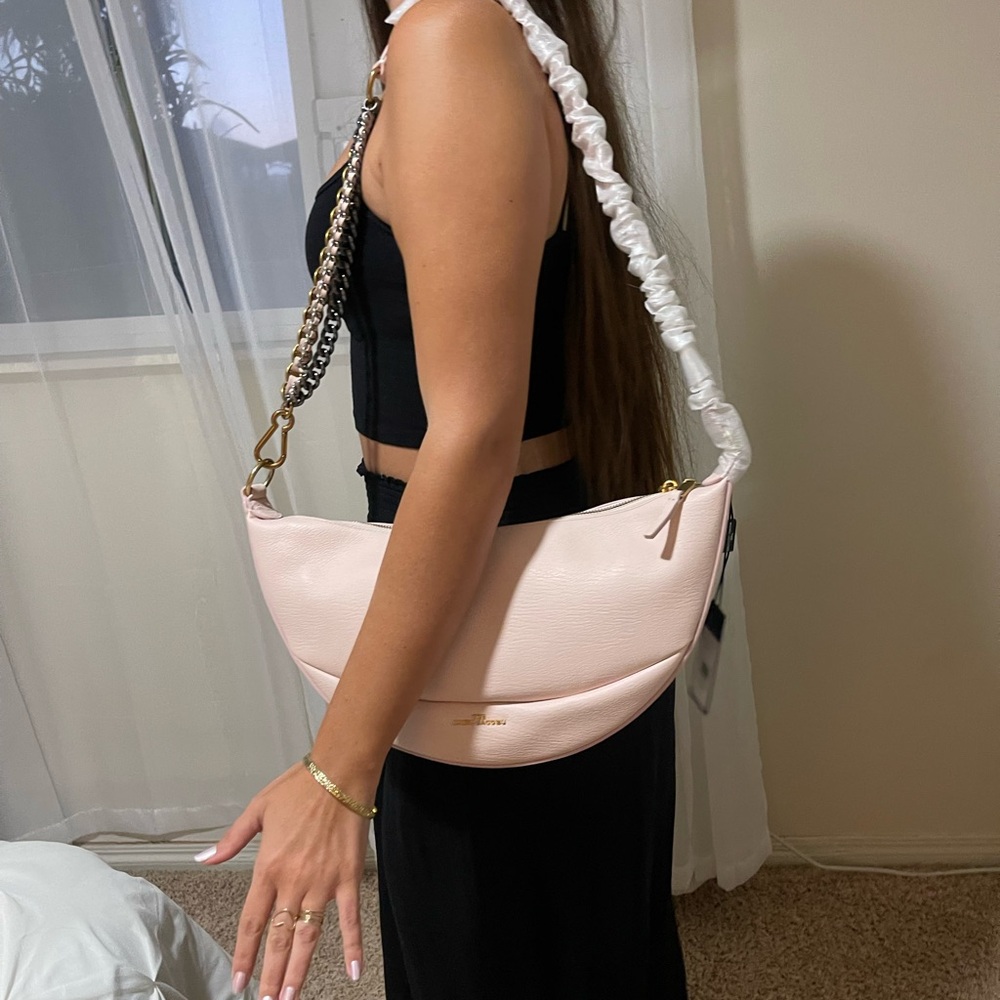 The Marc Jacobs
Pink Tutu 
Half Moon Crescent purse